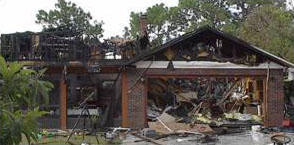 house that appears to be destroyed by some kind of disaster